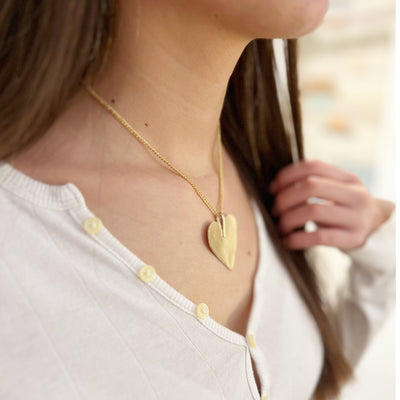 Model wearing Baby Love Necklace 16-inch chain