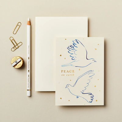 Back of Peace On Earth card featuring subtle gold foil details