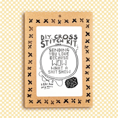 Beginner cross stitch kit with hoop, floss, Aida fabric, and pattern that reads “Sending you love because wow what a shit show”
